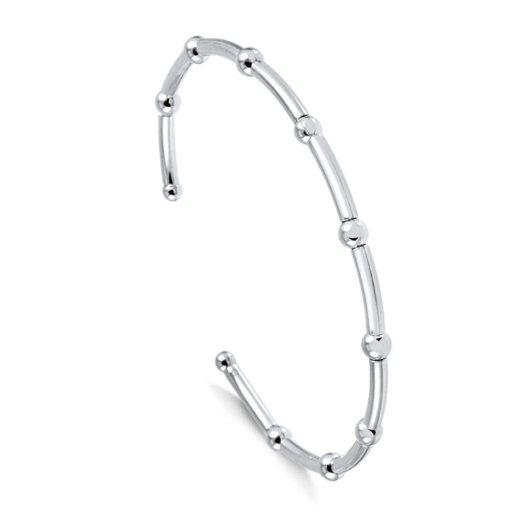 Bracelete aberto fino com bolinhas, super delicado.